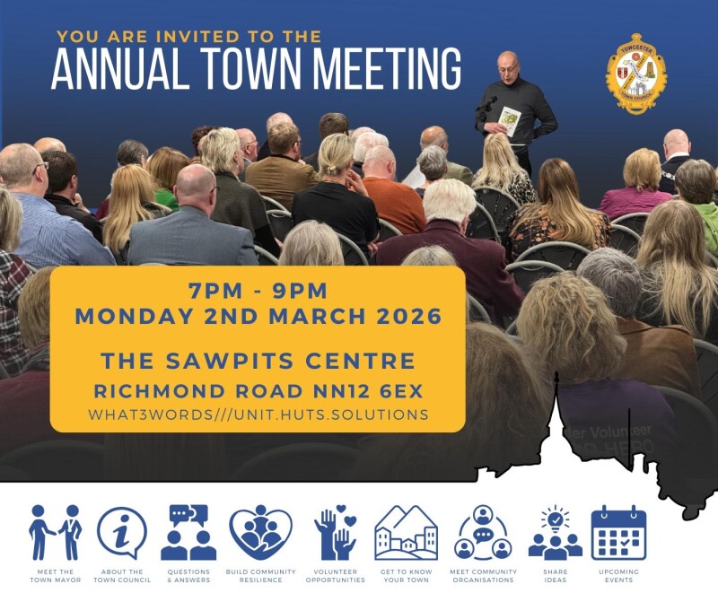 Image shows a town meeting in progress with a speaker at the front of a crowd of seated audience. Text over gives details of time and date of the meet