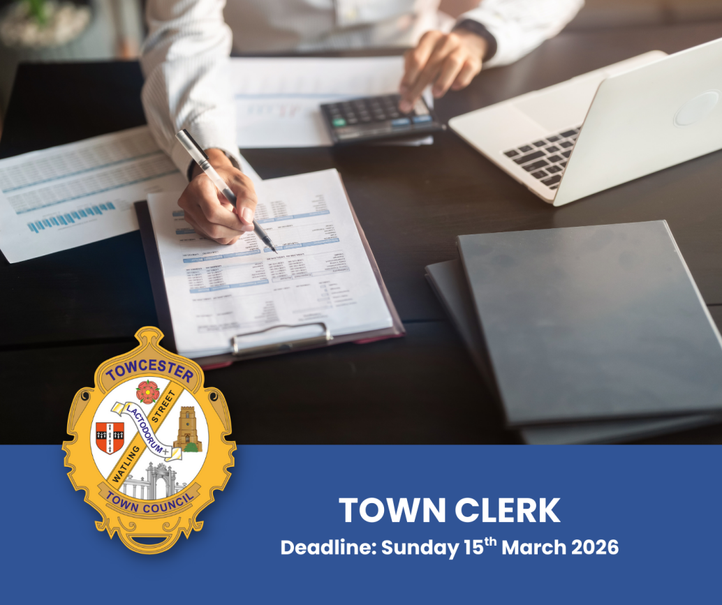 Image shows close up of office worker working on financial paperwork